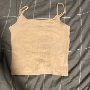 This is an American eagle tank top in a tan ish color. Size small.